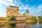 Admiring Philae Temple in Aswan on 7-day Cairo, Luxor and Aswan Egypt Easter Tour